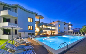 ISA-Residence with swimming-pool in Marina di Cecina only 700 meters from the sea, studio-apartments with air conditioning and private outdoor area